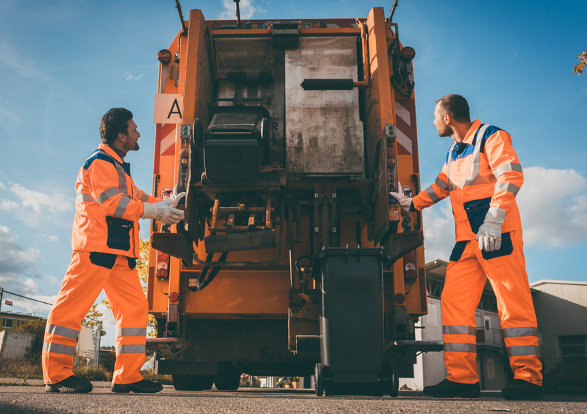 operators with a refuse lorry