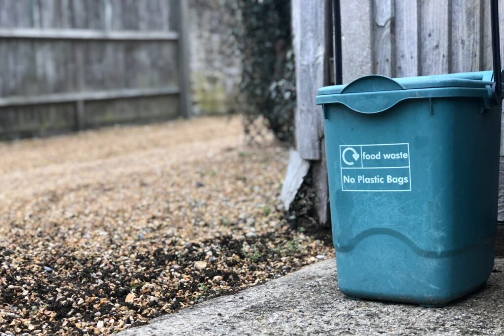 A food waste bin outside. These bins can be used to reduce business waste costs.
