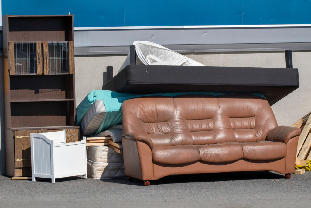 Old furniture waste, containing POPs left on the street