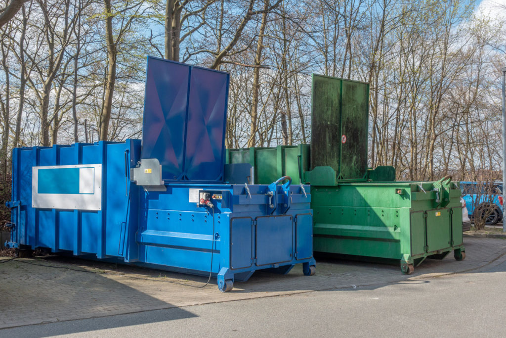 Two waste compactors with SmartTrash units