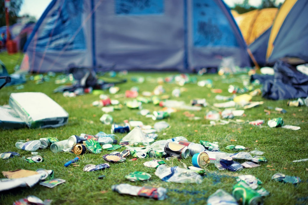 Festival litter in front of a tent